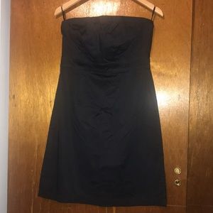 Black strapless knee high party dress.